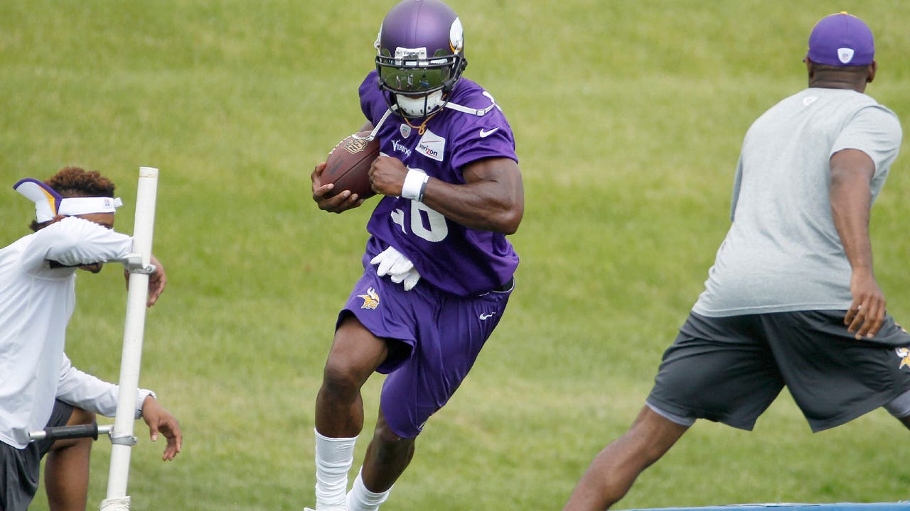 Peterson back with Vikings but normalcy still awaits